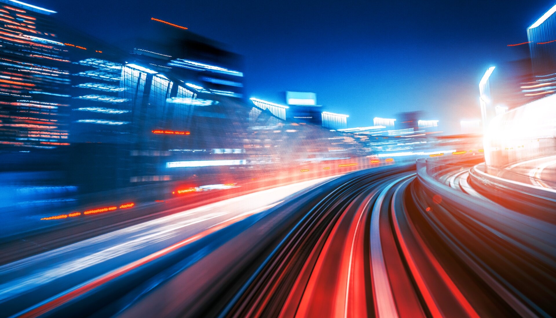 © iStock-962650288_Nikada (High Speed Motion Blur driving through a tunnel at night Futuristic High Speed Monorail Train Tokyo, Japan)